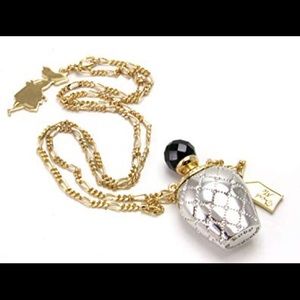 New never worn Disney Couture potion necklace